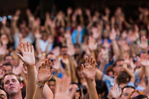 people-hands-raised